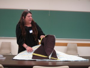 Ann-Marie is explaining about the NICU isolette covers that she will be teaching members how to make at the Nov. 2 9-2:45 SewDown.