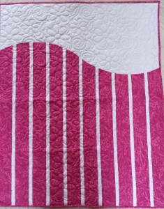 A sweet baby girl will snuggle under this quilt!