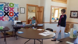 Cindy, right, Hazel, and Emily, discussing the aspect of designing a quilt projects